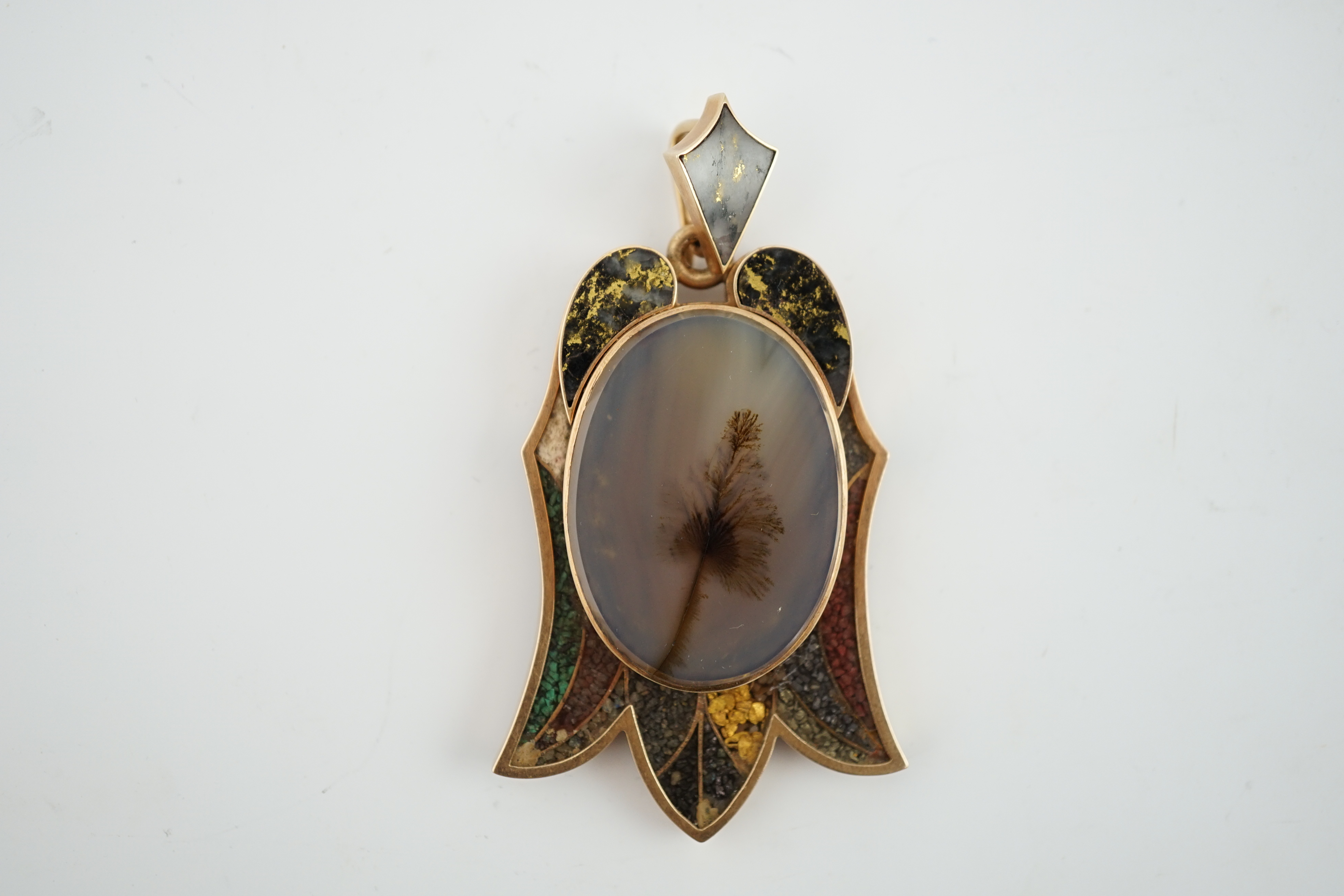 An unusual early 20th century? gold and hardstone mounted moss agate pendant, engraved verso 'A. Andrews Pat.d Dec. 18.1877'